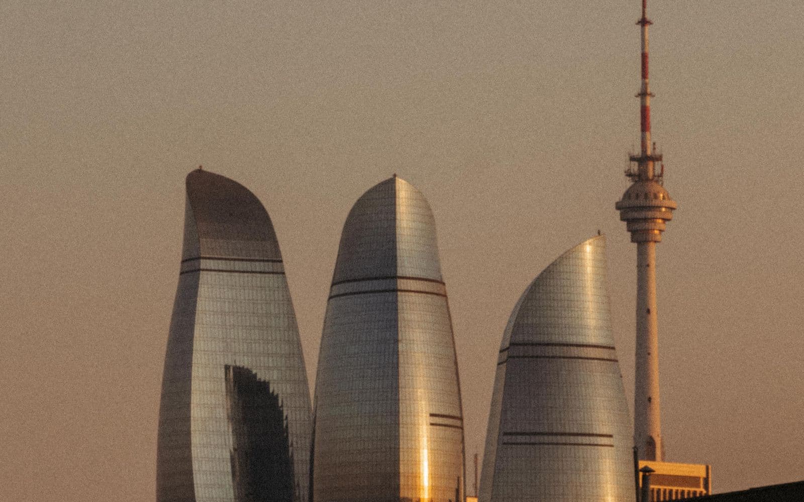 Baku's Flame Towers and skyline at sunset, Azerbaijan