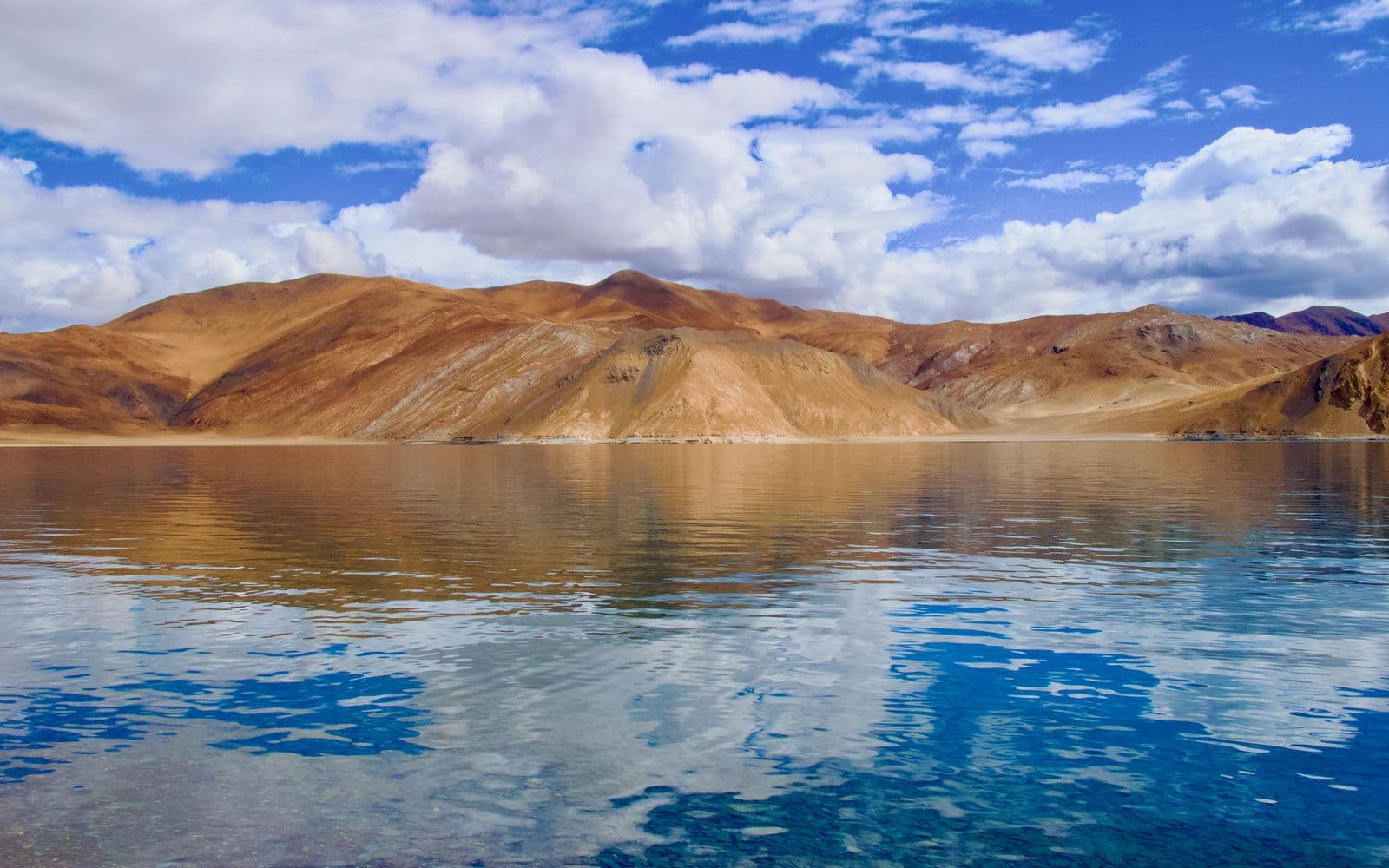 Azure waters of Pangong Tso against barren Himalayan slopes, Ladakh