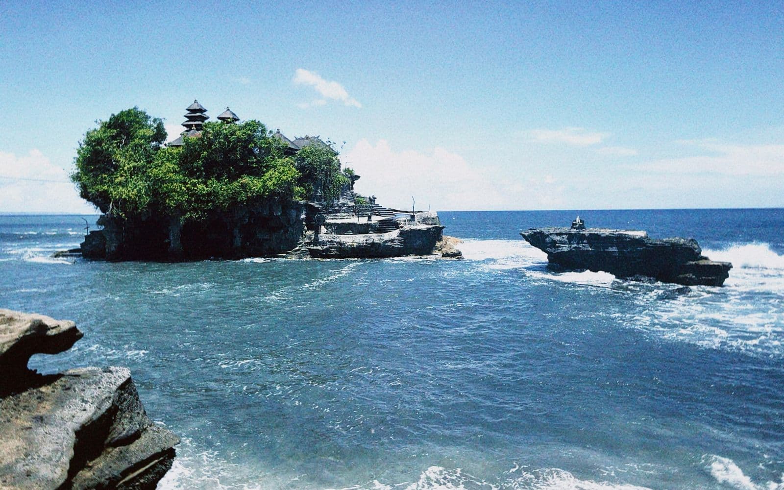 The Tanah Lot sea temple on its rock off the Bali coast