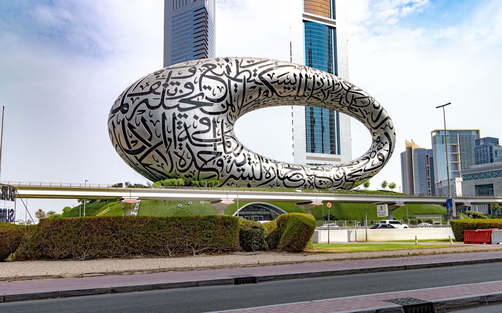 The steel Museum of the Future with its Arabic calligraphy facade on Sheikh Zayed Road