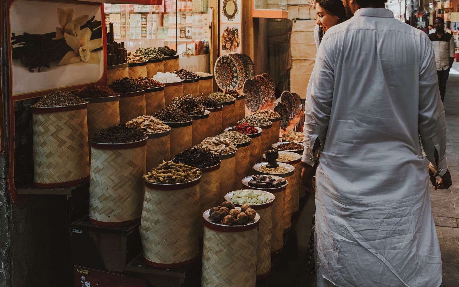 Sacks of spices and dried goods in a shop in the old Dubai souk
