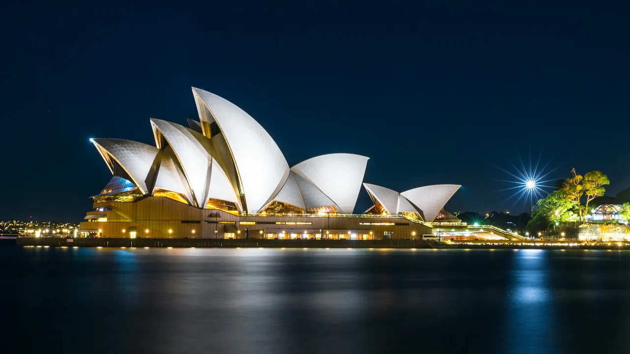 Sydney Opera House and harbour at night